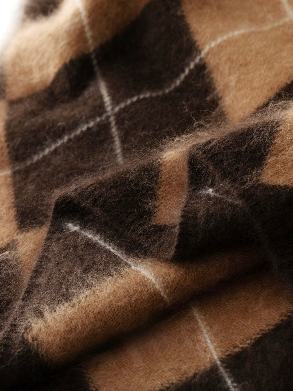 Close-up of brown and beige plaid wool